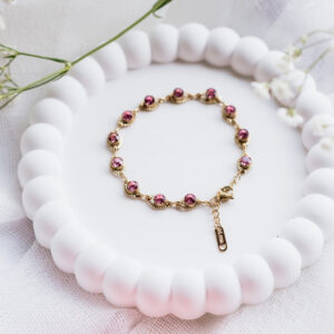 Ατσάλινη χρυσή αλυσίδα για το χέρι με ροζ πετράδια